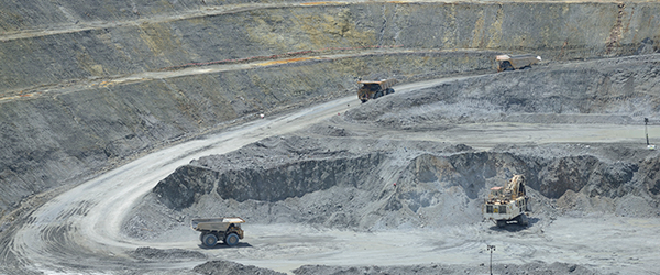 Haul trucks in the Lihir open pit